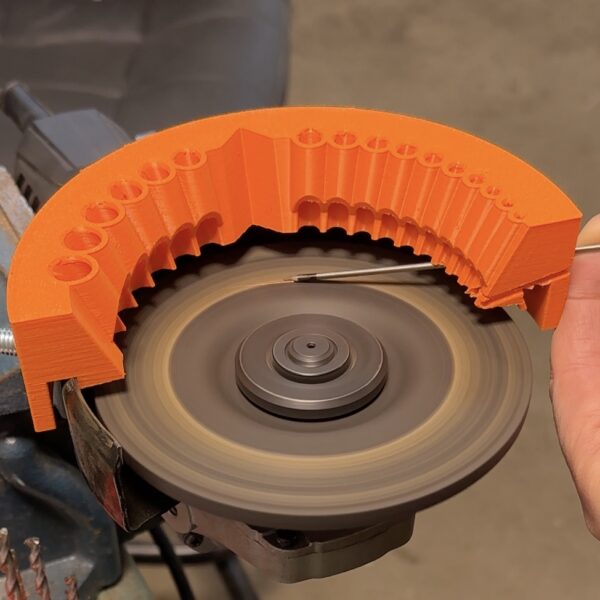 High-resolution image of the drill bit sharpener attachment mounted on an angle grinder, demonstrating its robust design and precision engineering for sharpening drill bits and tungsten electrodes.